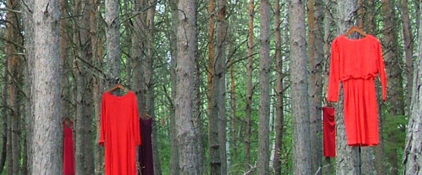 red dresses on trees